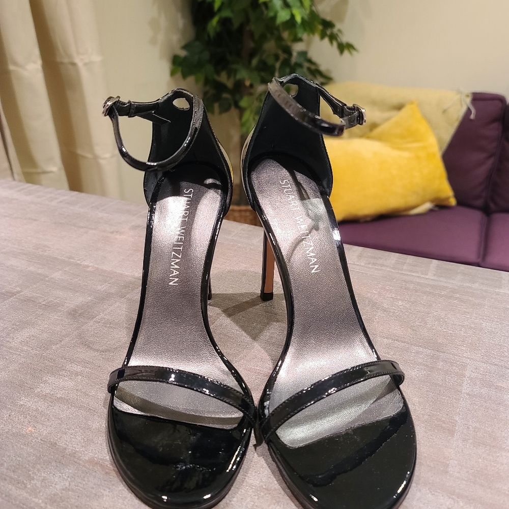 Stuart Weitzman black heels size 9.
